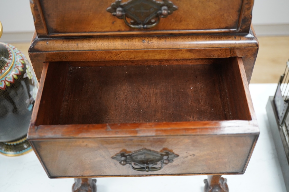 An early 20th century miniature walnut four drawer chest, 67cm